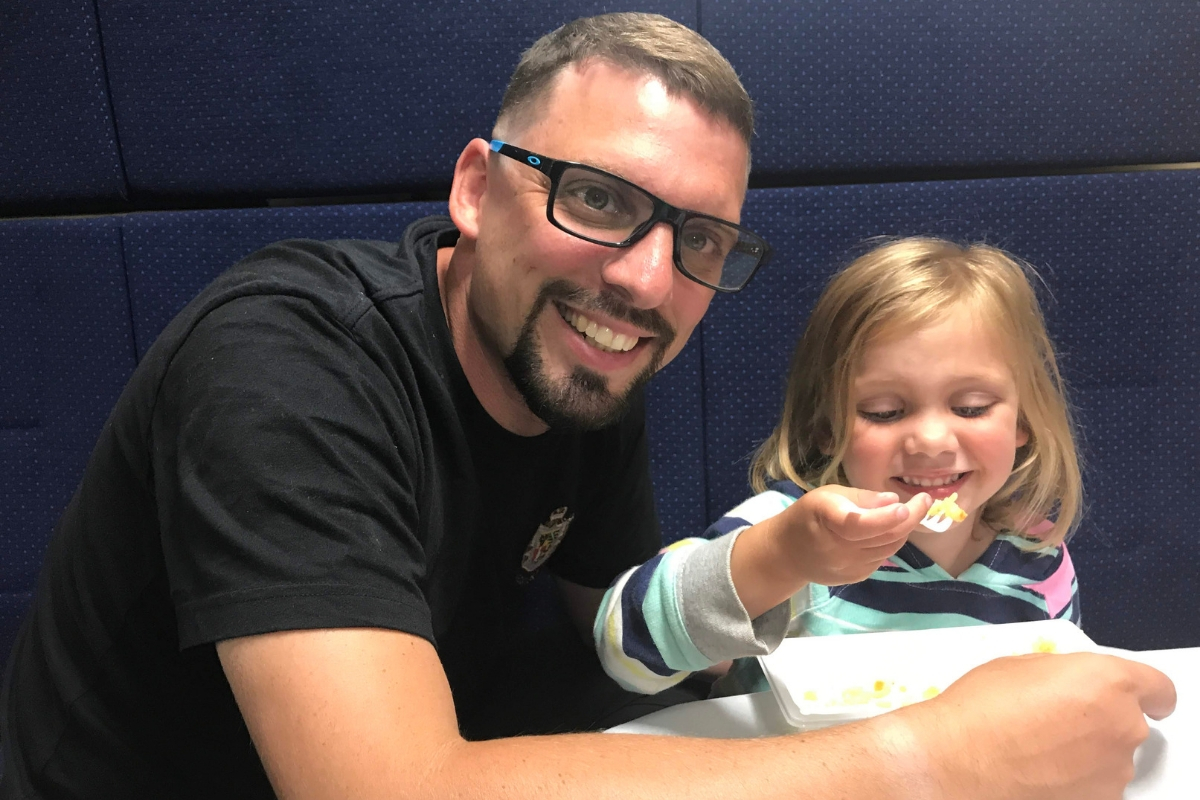 Joel and C eating on the Trans-Siberian